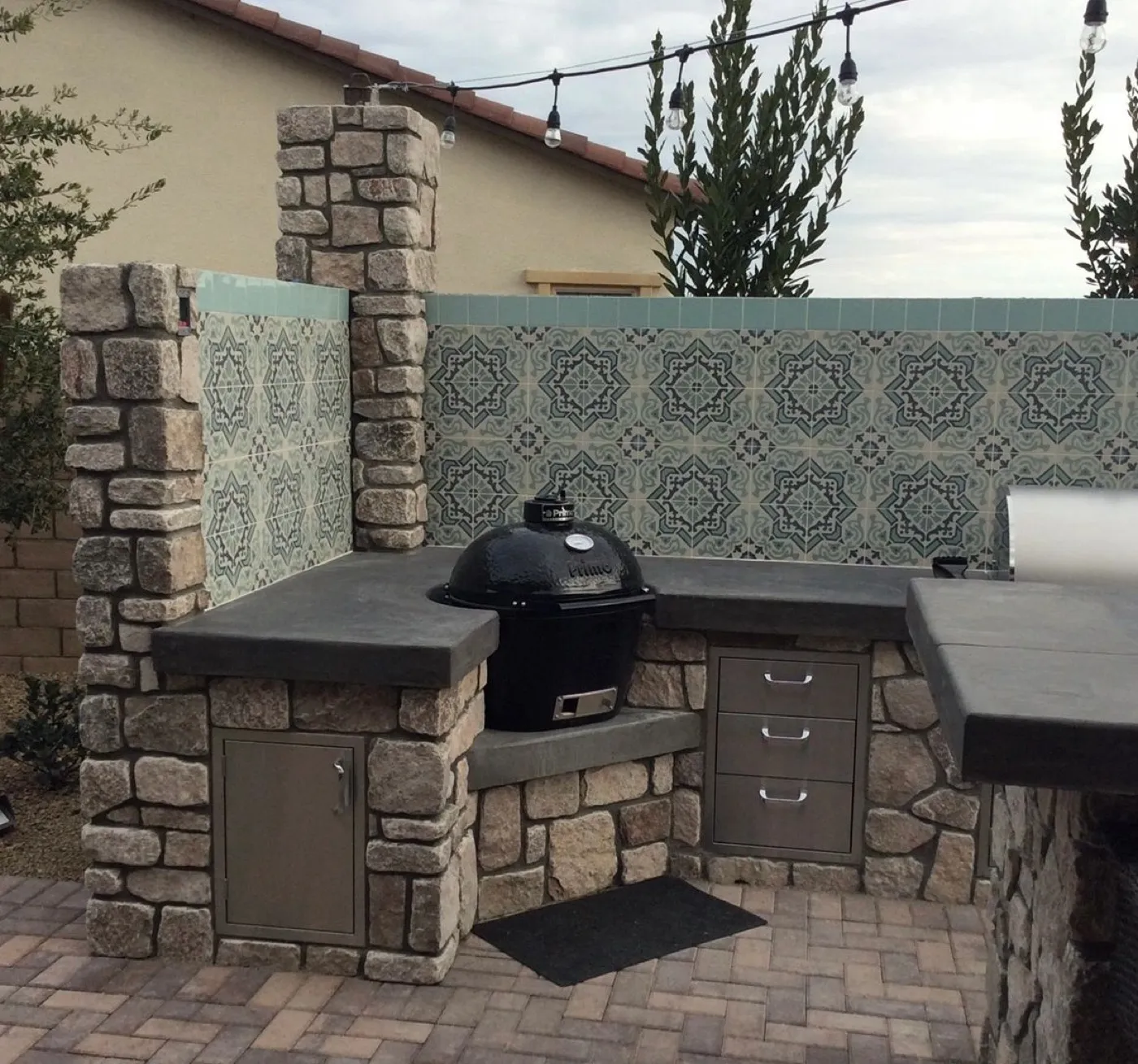 Custom stone BBQ island and outdoor kitchen built by Ram Masonry in Las Vegas